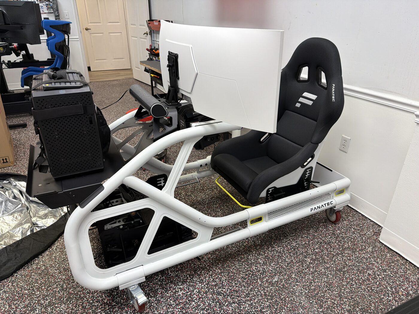 A racing simulator chassis being built in our shop