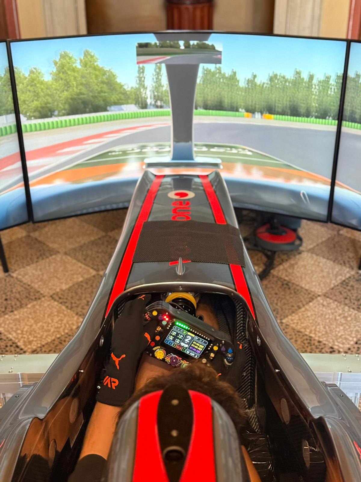 Driver's view from a Formula-style racing simulator cockpit